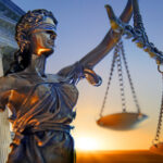 Blind lady with justice statue